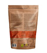 Parte trasera de paquete de proteína vegana en polvo con fibra, ingredientes y tabla nutricional.